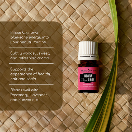 Young Living Okinawa Shell Ginger essential oil bottle on a woven surface with text about its benefits.