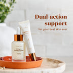 Two skincare products from Young Living are displayed on a terracotta dish against a bright, soft-focus background. The products are the Collagen Peptide Serum in a frosted glass dropper bottle with a gold cap, and the Brighten Eye Cream in a white tube with a gold cap.
