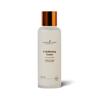 A 120 mL bottle of Young Living Exfoliating Toner with a frosted white body and a metallic copper cap, shown on a clean white background with a soft shadow.