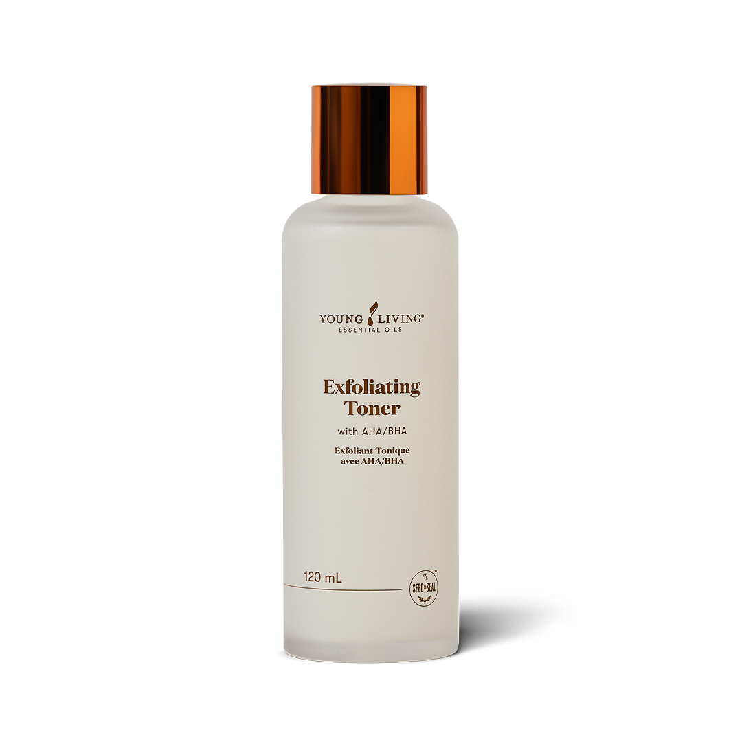 A 120 mL bottle of Young Living Exfoliating Toner with a frosted white body and a metallic copper cap, shown on a clean white background with a soft shadow.