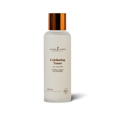 A 120 mL bottle of Young Living Exfoliating Toner with a frosted white body and a metallic copper cap, shown on a clean white background with a soft shadow.