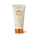A 50 mL squeeze tube of Young Living Skin Plus Light Moisturizer with Hyaluronic Acid. The tube is a warm cream color with gold text and a metallic gold cap, set against a clean white background with a soft shadow.