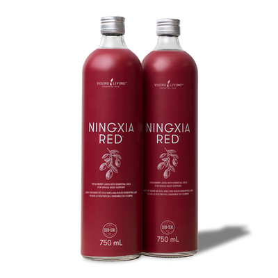 Two 750 mL bottles of Young Living NINGXIA RED shown side by side on a white background with a soft shadow.