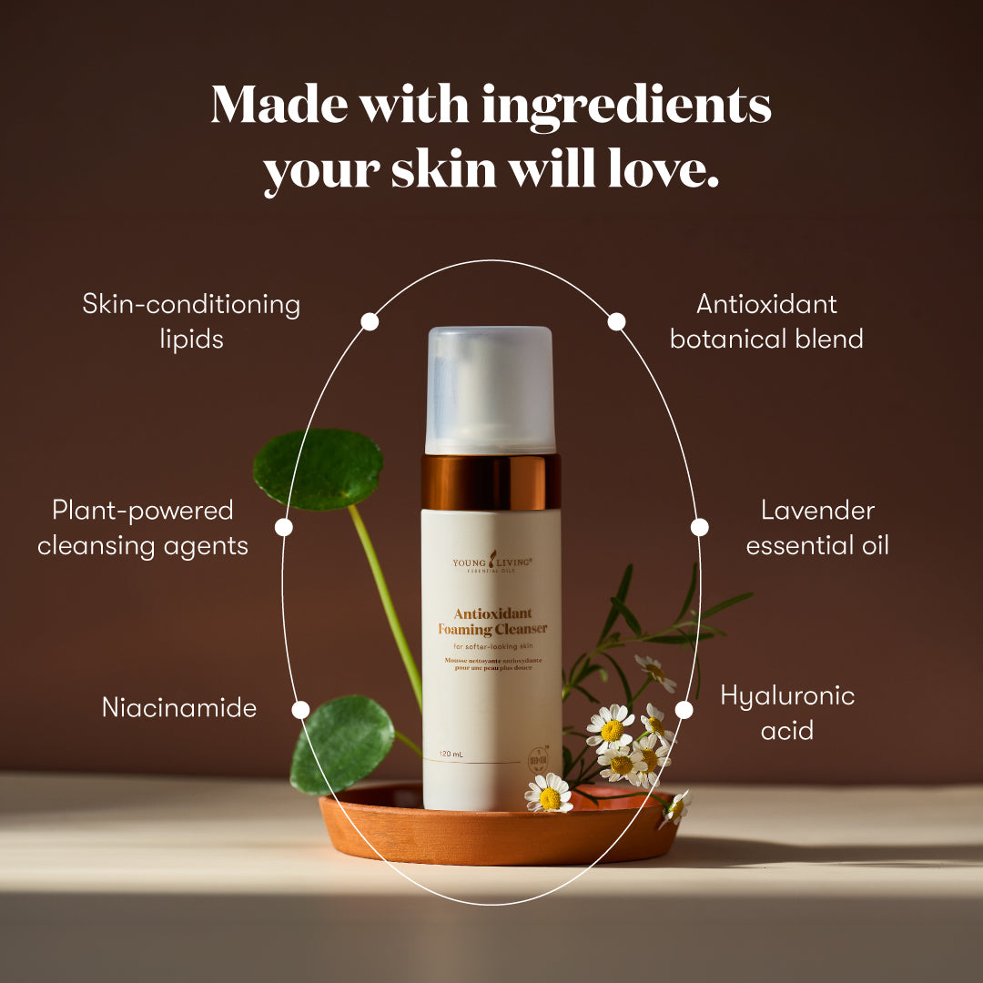  dark brown background, surrounded by text highlighting ingredients such as skin-conditioning lipids, plant-powered cleansing agents, niacinamide, lavender essential oil, hyaluronic acid, and an antioxidant botanical blend.