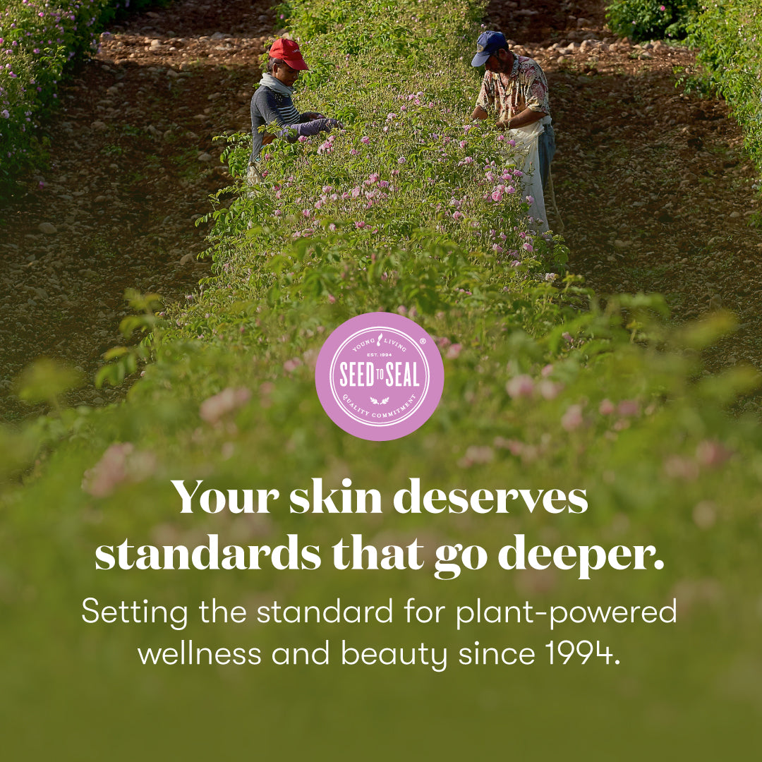 A promotional outdoor photo shows two people working along rows of flowering plants in a garden. Large overlaid text reads, 'Your skin deserves standards that go deeper.