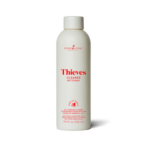White bottle of Thieves Cleaner with red text on a white background